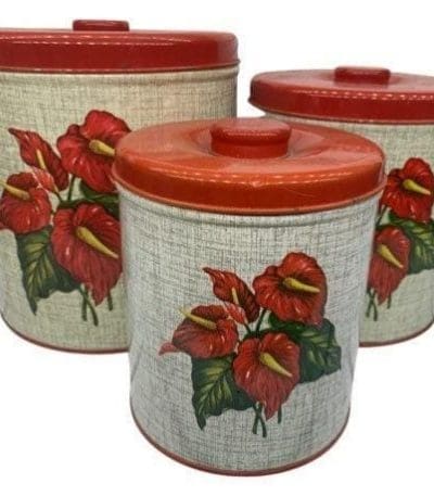Vintage red flower pattern metal tin canister set.